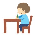 clip art of a man studying at a desk
