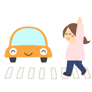 横断歩道を手を上げて渡っている女の子の無料イラスト