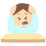 机で頭を抱える男の子の無料イラスト