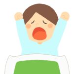布団から起きて寝起きのあくびをする男性の無料イラスト