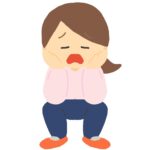 座ってため息をついている女性の無料イラスト