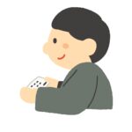 名刺交換をしている黒髪の男性の無料イラスト