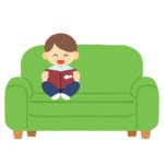 ソファーで絵本を読む子どもの無料イラスト素材