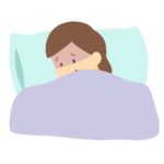具合が悪くて寝ている女性の無料イラスト素材