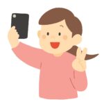 スマホで自撮りする女性の無料イラスト素材