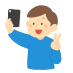 スマホで自撮りする男性の無料イラスト素材
