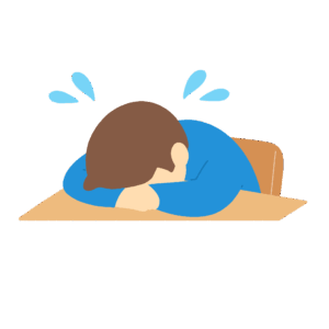机に伏せて泣く人の無料イラスト素材
