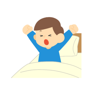 布団から起き上がる男の子の無料イラスト素材